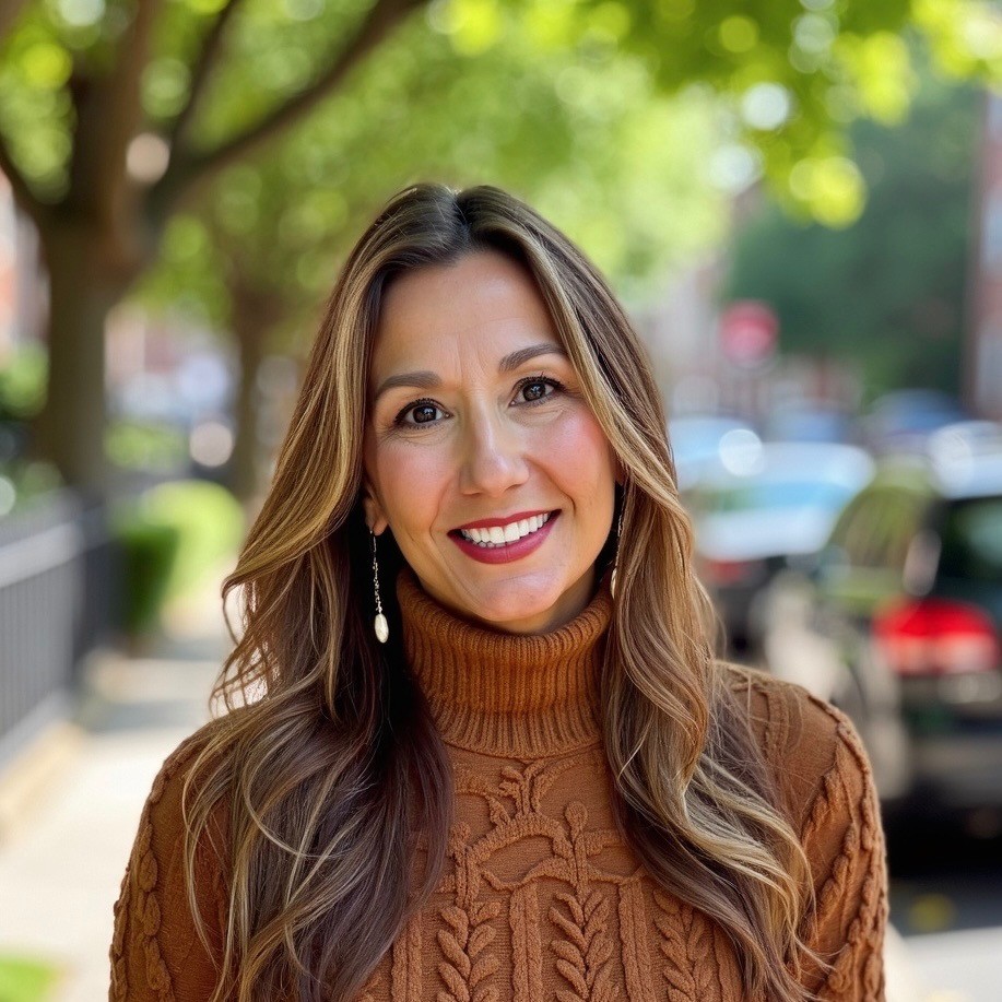 Amber Fuller, AMFT, smiling outdoors